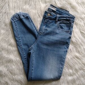 Cello Mid Rise Fringed Hem Crop Skinny Jeans